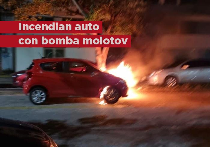 Con bomba molotov incendian auto