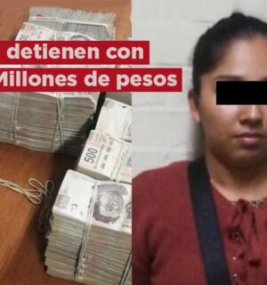 Policías atrapan a mujer que transportaba más de 5 mdp en el AICM